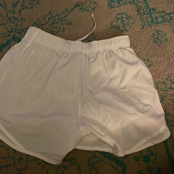 selling these white nike shorts , size small. Never worn. No rips or stains - Picture 2 of 3